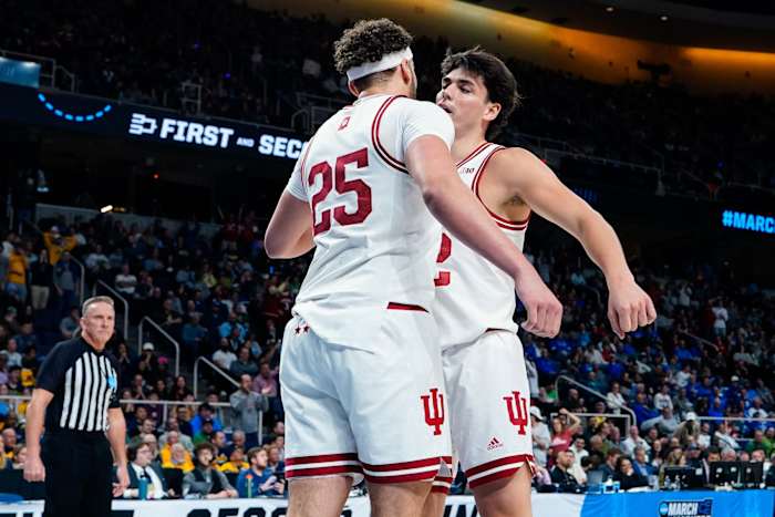 Race Thompson (25) reacts with guard Trey Galloway (32) in the first half against the Kent State Golden Flashes at MVP Arena.